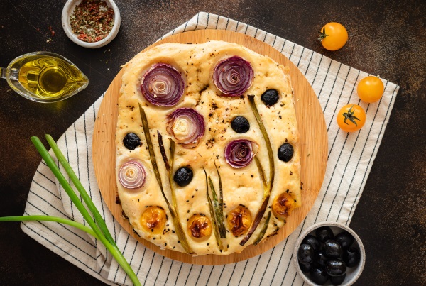 Round Focaccia with Decorative Artsy Herb Patterns