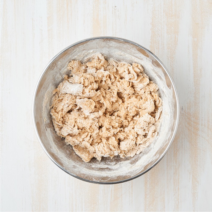 bring the dough together mixing with hands