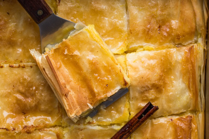 golden baked galaktoboureko soaked with syrup
