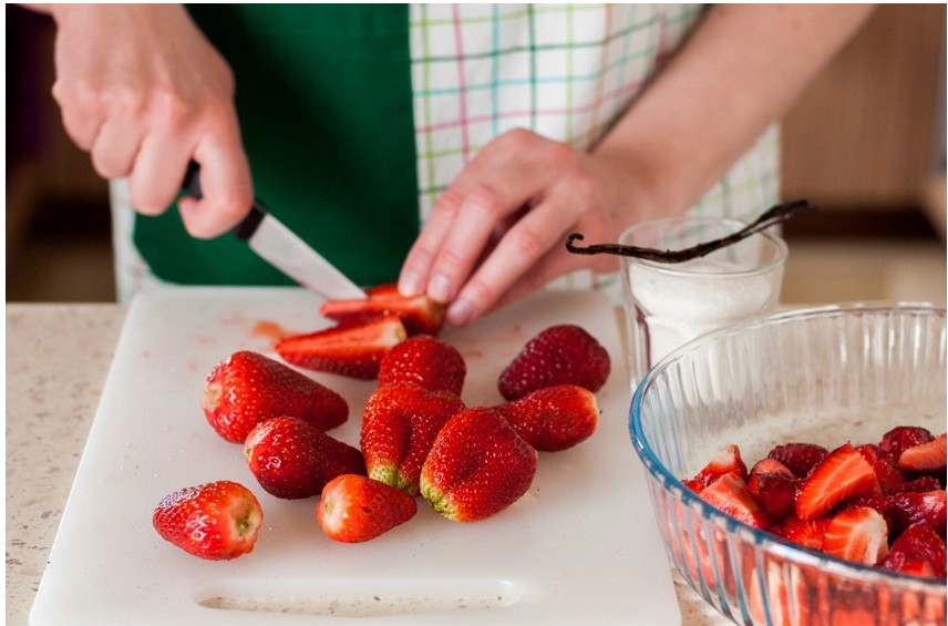 Wash and cut the strawberries then dry them